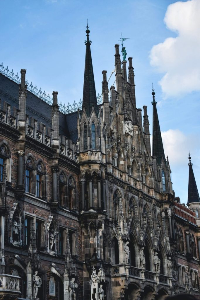 Stunning Gothic architecture of the Munich Town Hall in Germany under a blue sky.